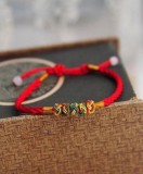 Áldást hozó buddhista karkötő