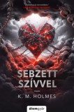 Álomgyár Kiadó K. M. Holmes: Sebzett szívvel - könyv