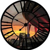 Consalnet Naplemente és stadion az óra mögött vlies poszter, fotótapéta 10618VEZ1 /208x208 cm/