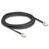Delock Telefon kábel RJ11 apa - RJ11 apa fekete 3 m