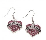 Fülbevaló "TWIRLING" felirattal