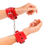KINK WRIST RESTRAINT Kink – állítható piros csuklókötöző fekete szívvel