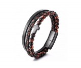 Kis keresztes tigrisszem gyöngyös barna-fekete színű valódi bőr férfi karkötő