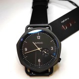 Komono elegáns fekete cseppálló uniszex nagyszámlapos karóra (41mm)