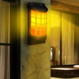 kütyübazár Hangulatos láng hatású napelemes fali lámpa, dekoráció
