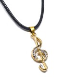 Maria King Arany színű kristályos Violinkulcs medál fekete bőr nyaklánccal