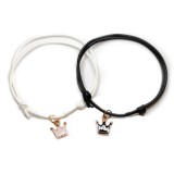 Maria King Fekete-fehér zsinórszövet karkötő fekete és pink tűzzománc korona charmmal