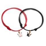 Maria King Fekete-piros zsinórszövet karkötő fekete és pink tűzzománc korona charmmal