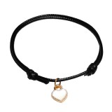 Maria King Fekete zsinórszövet karkötő fehér tűzzománc szív charmmal