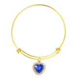 Maria King Kék kristály szív charm arany színű nemesacél karperecen
