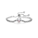 Maria King Kristályokkal kirakott karkötő szív dísszel, ezüst színű - állítható méret