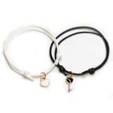 Maria King Páros zsinórszövet karkötő fehér szív és fekete kulcs charmmal II.