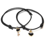 Maria King Páros zsinórszövet karkötő fekete szív és fekete kulcs charmmal