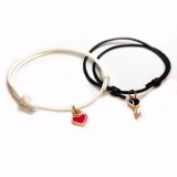 Maria King Páros zsinórszövet karkötő piros szív és fekete kulcs charmmal II.