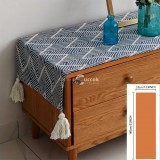 Modern japán stílusú, geometrikus csíkos asztali futó bojtokkal