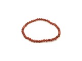 R.M.ékszer Goldstone vörös ásvány karkötő golyós 4mm