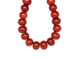 R.M.ékszer Karneol korong 15-17x11-14mm– ékszerkészítő alapanyag (füzér)