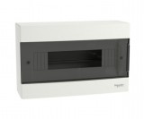 SCHNEIDER EZ9EUC112 EASY9 EU Kiselosztó, 12 modul, PE+N sínnel, füstszínű ajtóval, falon kívüli