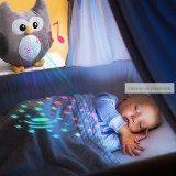 Zenélő, világító plüss bagoly